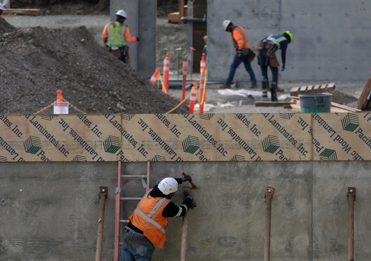 Insurance advisor explaining high-risk job classifications for construction and industrial workers